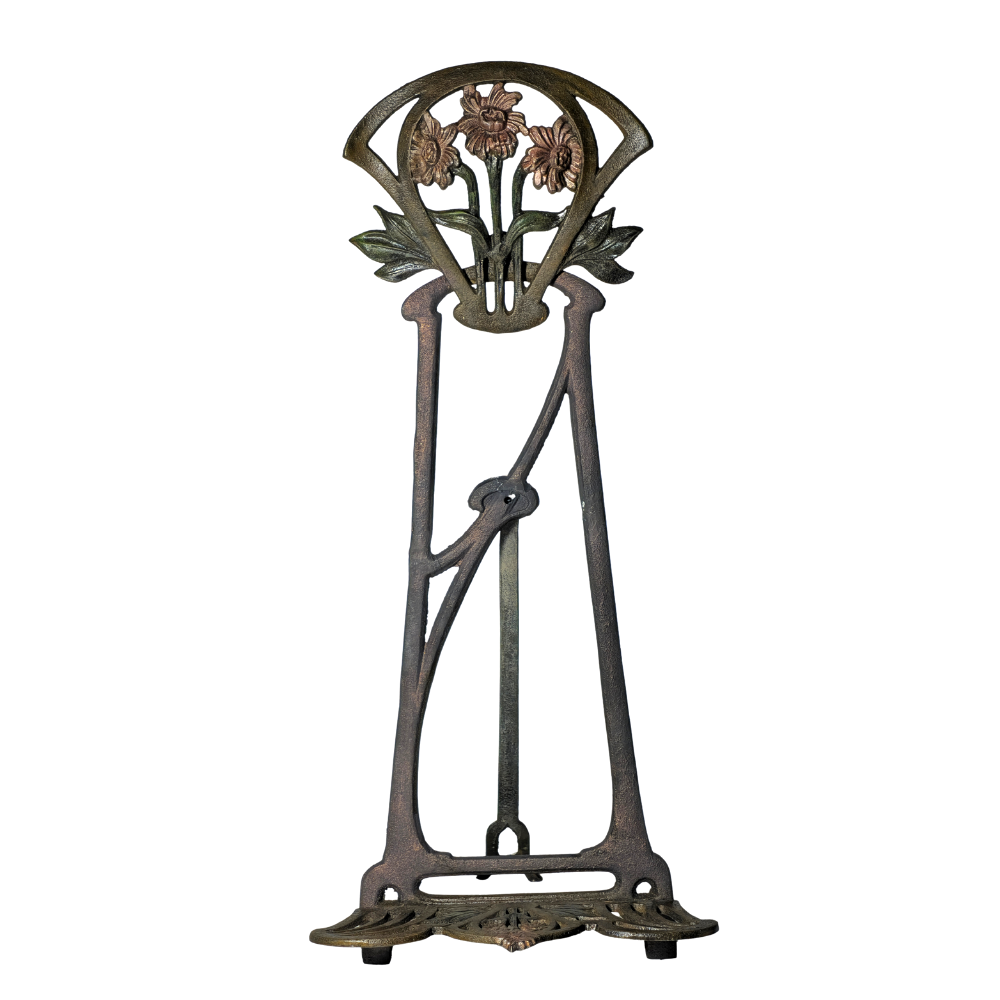 IRON LECTERN WITH FLORAL DECORATION.