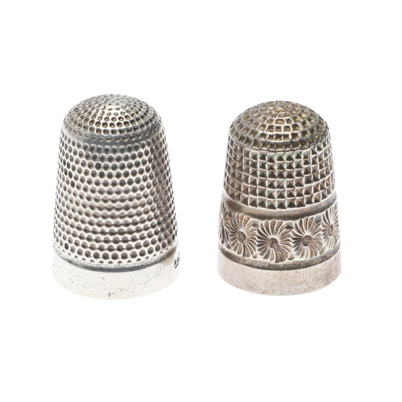 TWO SILVER THIMBLES.