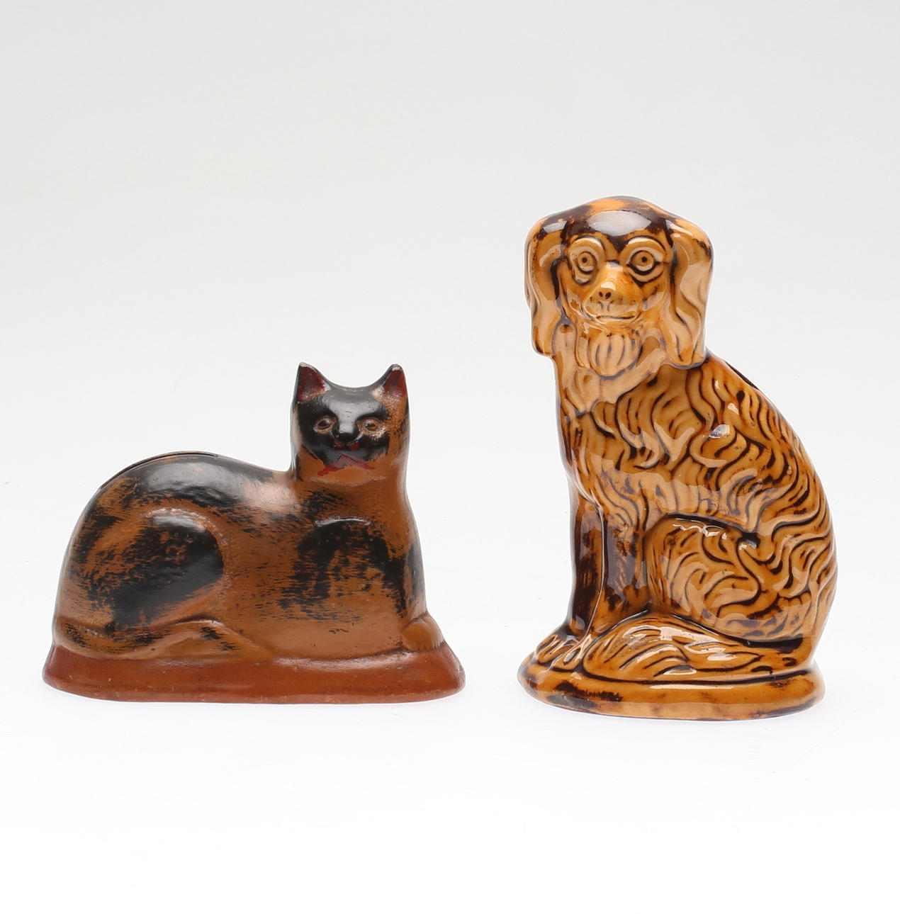 SPARBÖSSOR, 2 st, lergods, 1800-/1900-tal.