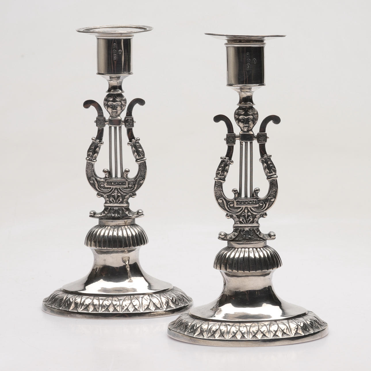 Two silver candlesticks, probably Johan Wixner, from Söderhamn, Empire,, so called lyrstacks, 1837.