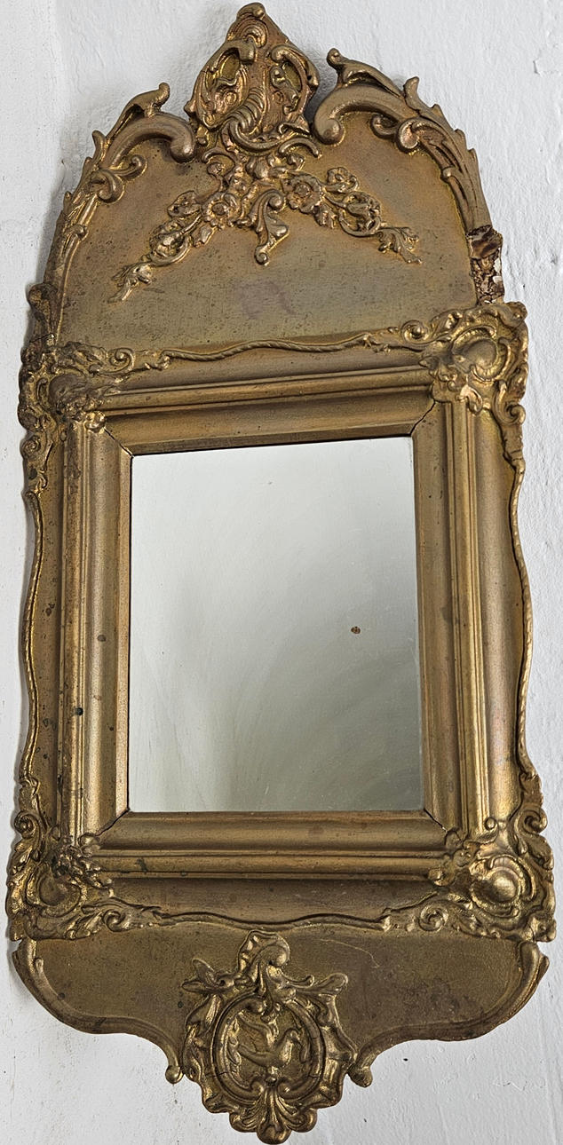 A 19th century neo-rococo mirror.