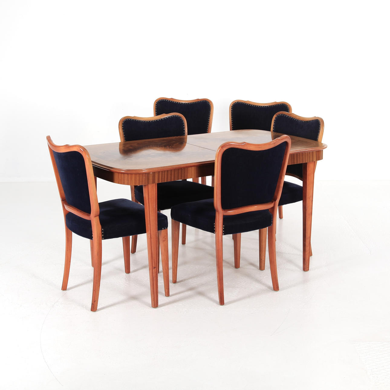 DINING TABLE WITH INSERTS AND 6 CHAIRS, Sweden 1950's.