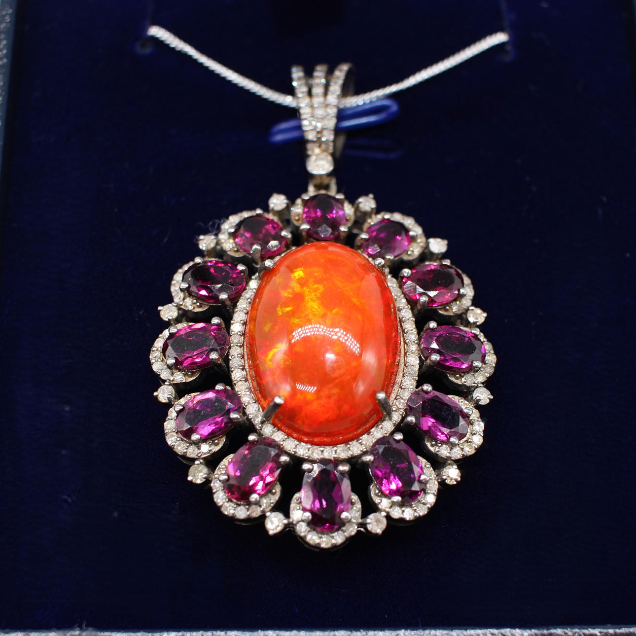 LARGE OPAL, GARNET & DIAMOND PENDANT.