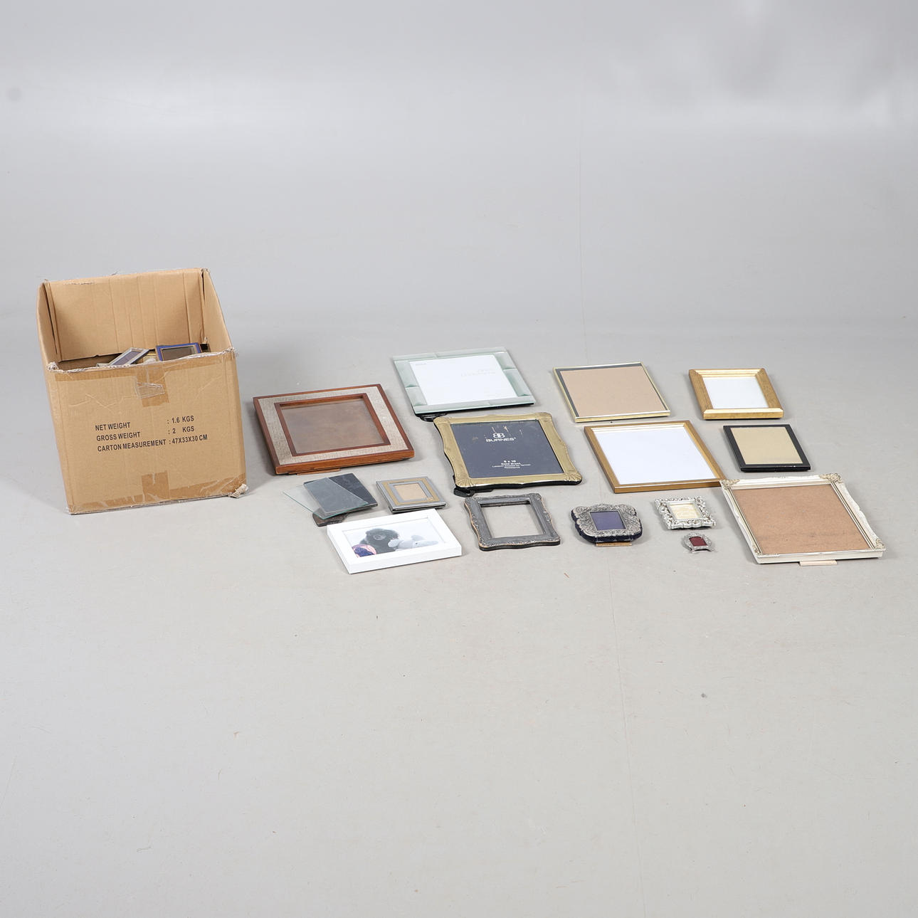 A SILVER FRAME AND A COLLECTION OF PHOTOGRAPH FRAMES. Photo, Cameras ...