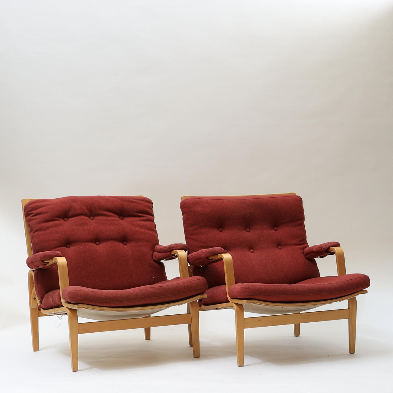 BRUNO MATHSSON. Armchairs, “Ingrid” Dux.