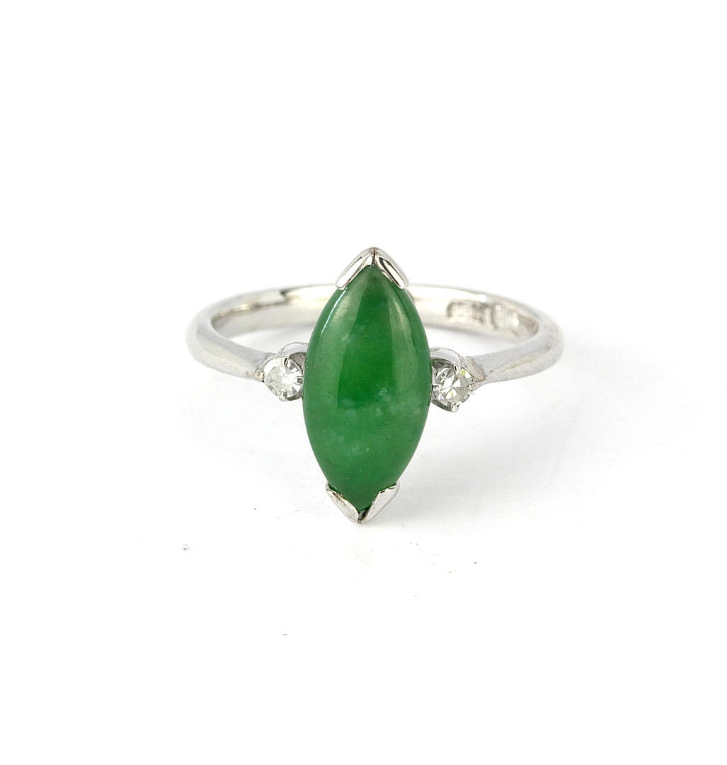 JADE AND DIAMOND 18CT RING.