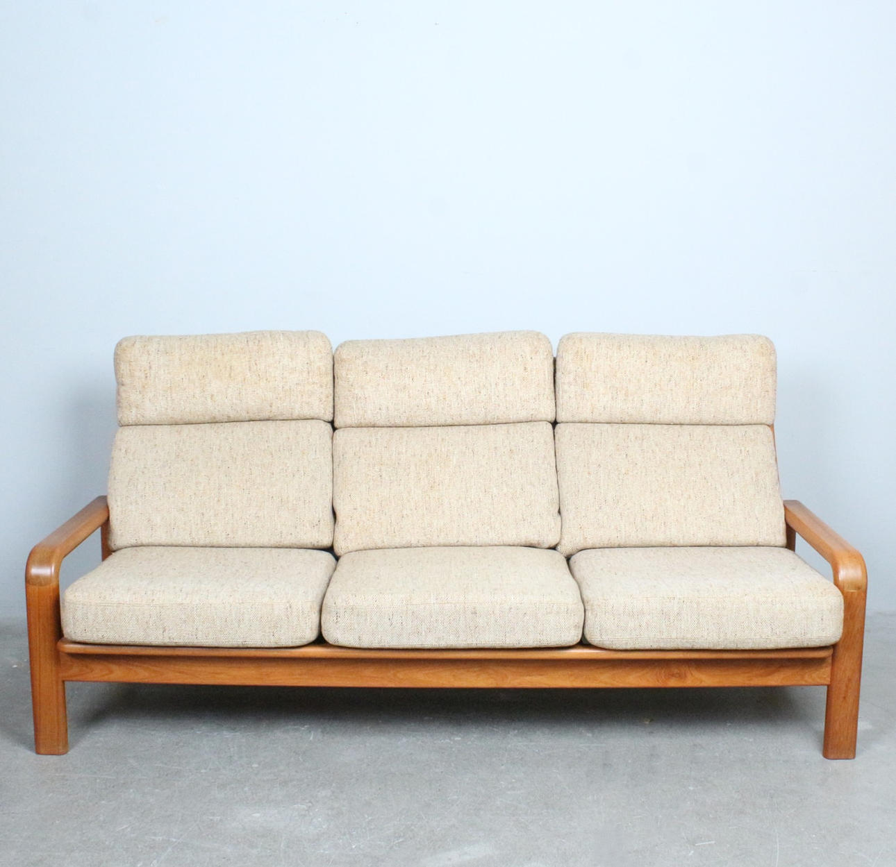 Three-seater, teak, wool, Denmark, 1970s.