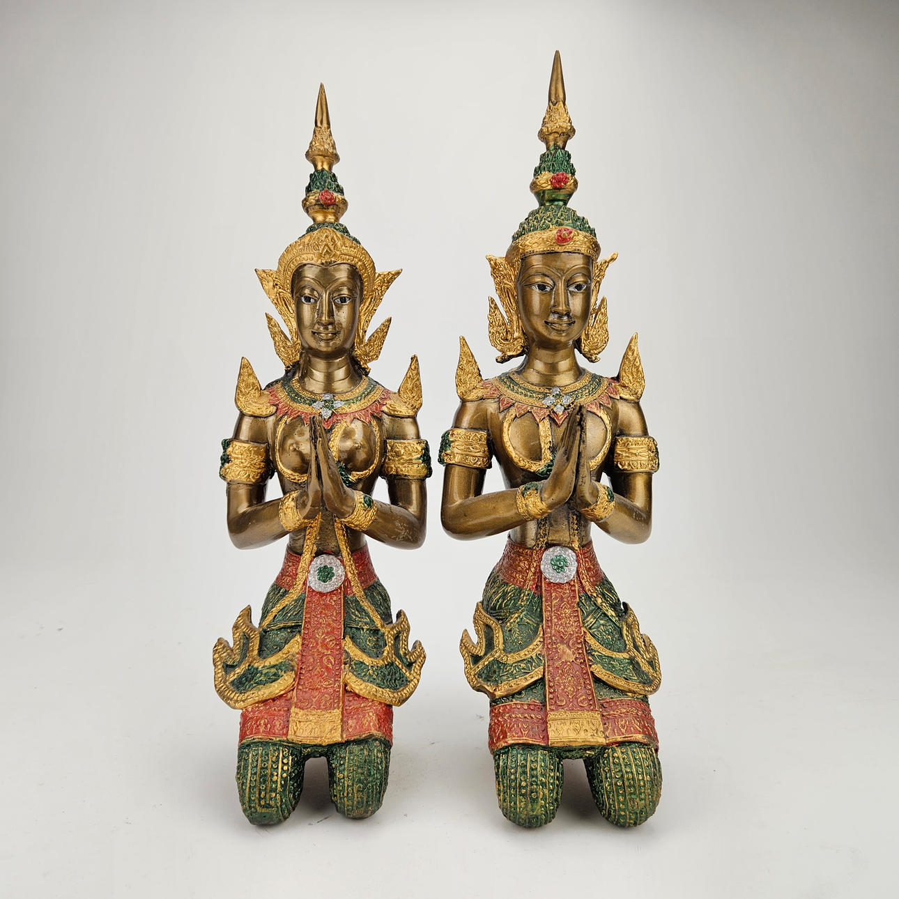 Two metal sculptures, probably Thailand.