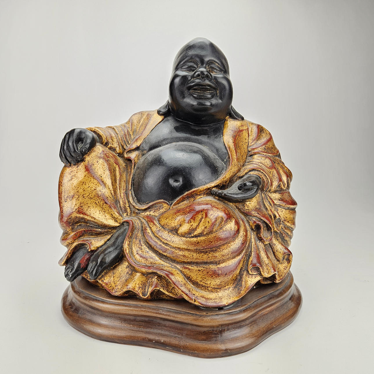 An oriental ceramic BUDDHA.