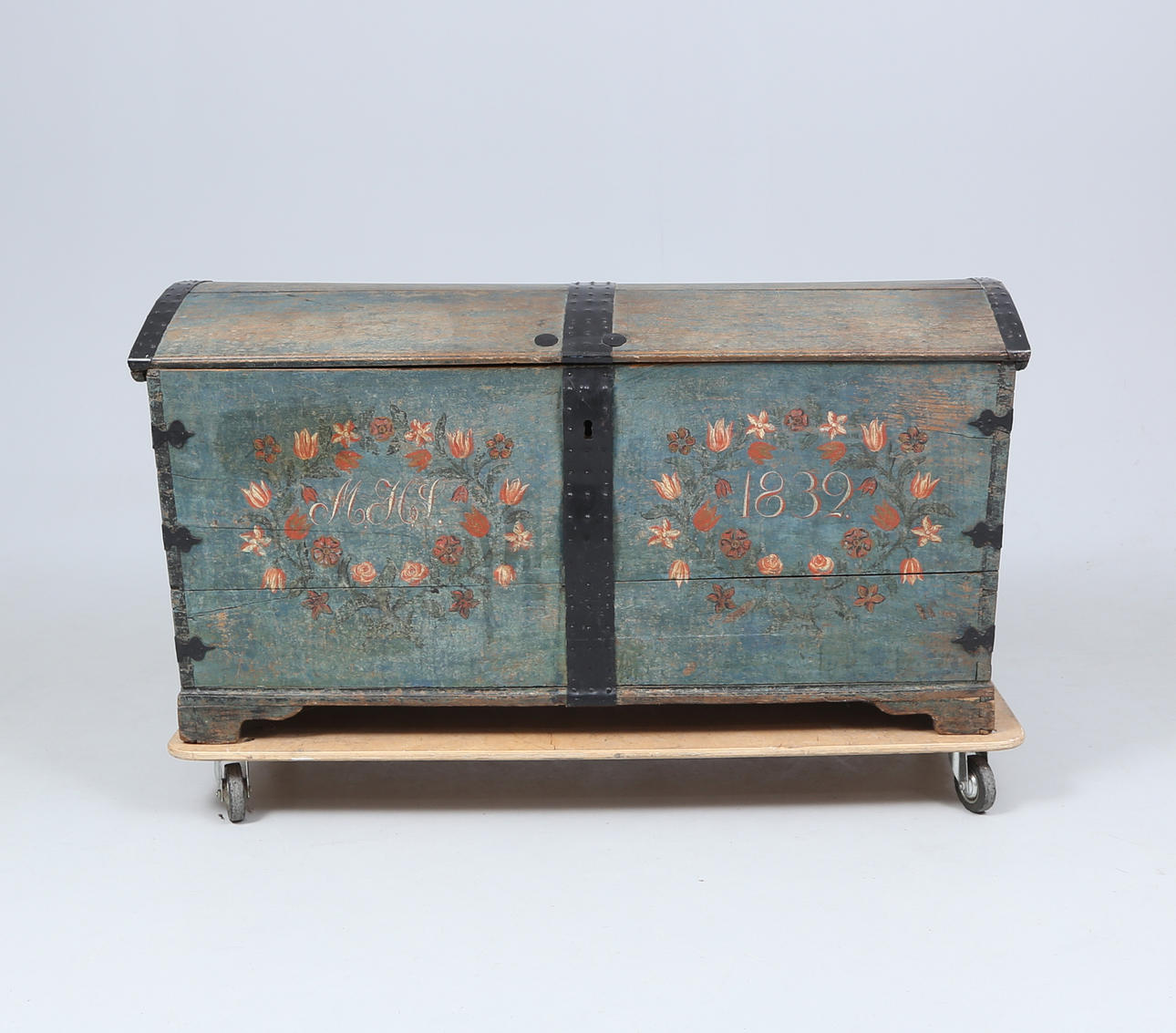 A chest of drawers, dated 1832.