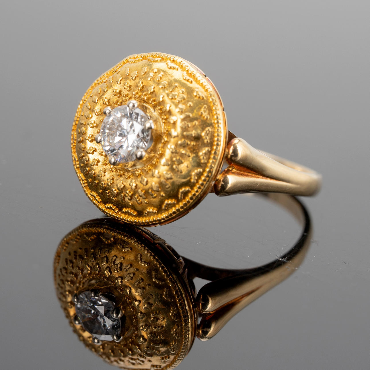 Ring with a diamond.