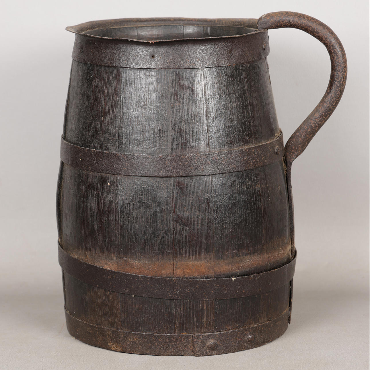 A 19TH CENTURY WROUGHT IRON BARREL SHAPED JUG. Collectables - Other ...