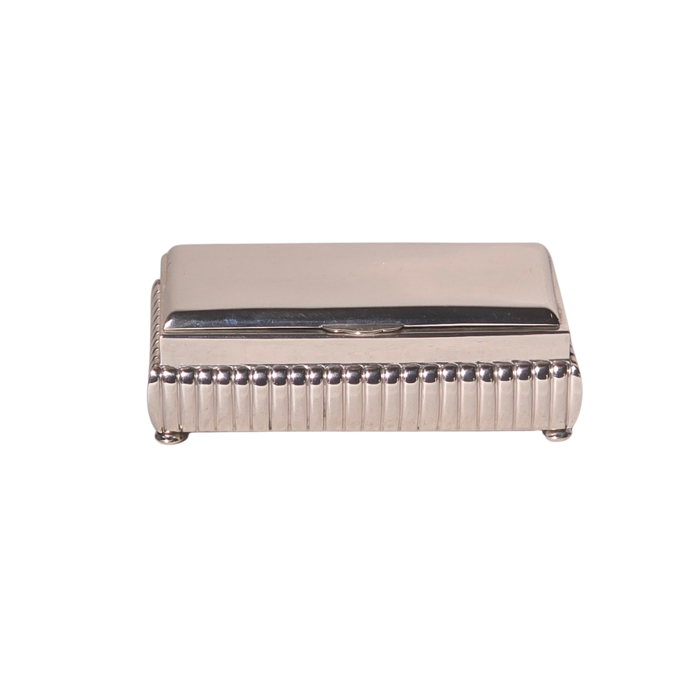 PUNCHED SILVER CIGAR BOX.