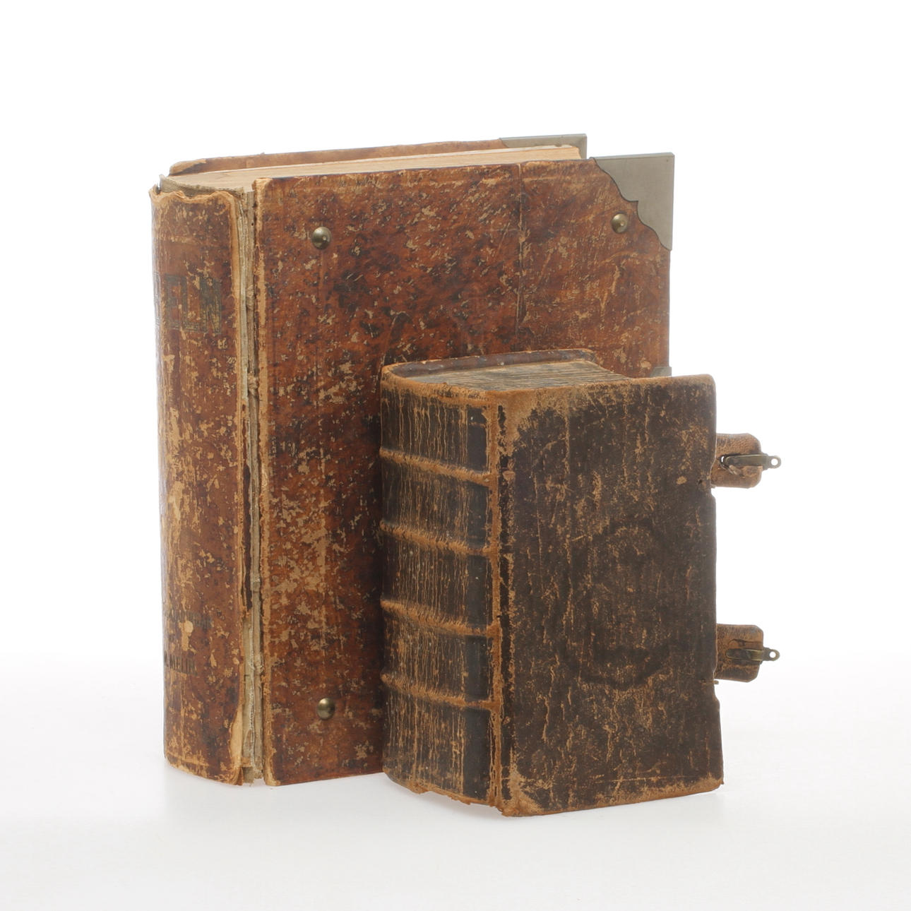 BIBLAR, 2 st, skinnband, 1750 samt 1883.