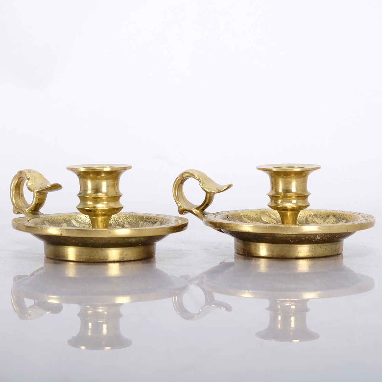 A pair of chambersticks.