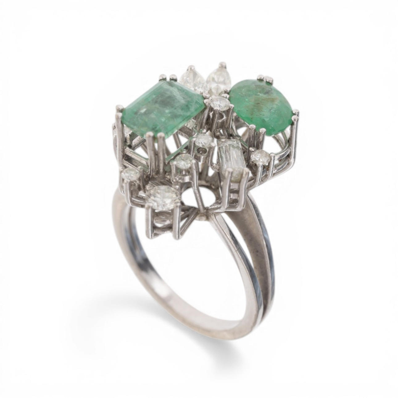 Emeralds and diamonds ring.