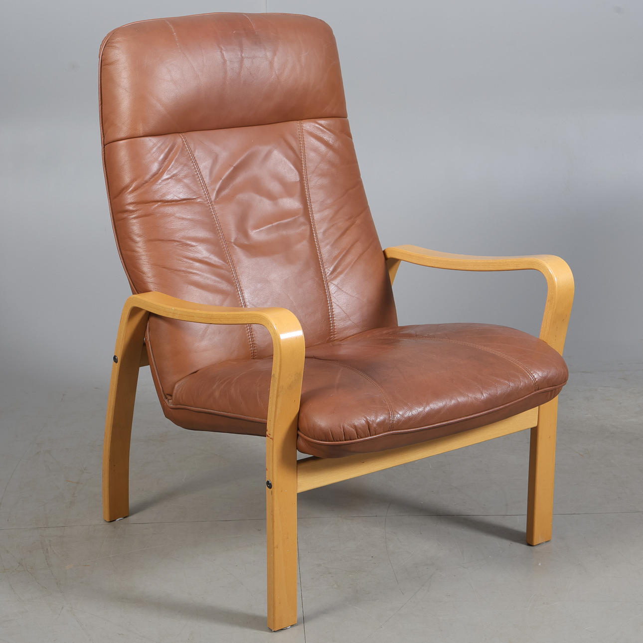 A Söderbergs leather armchair, later 20th century.