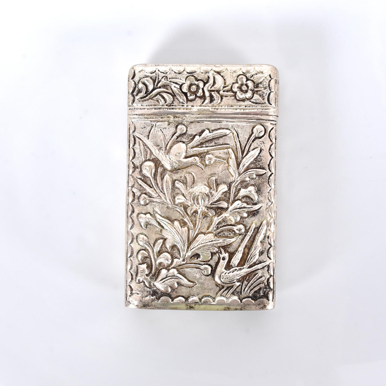 A silver cigarette case, 20th century.