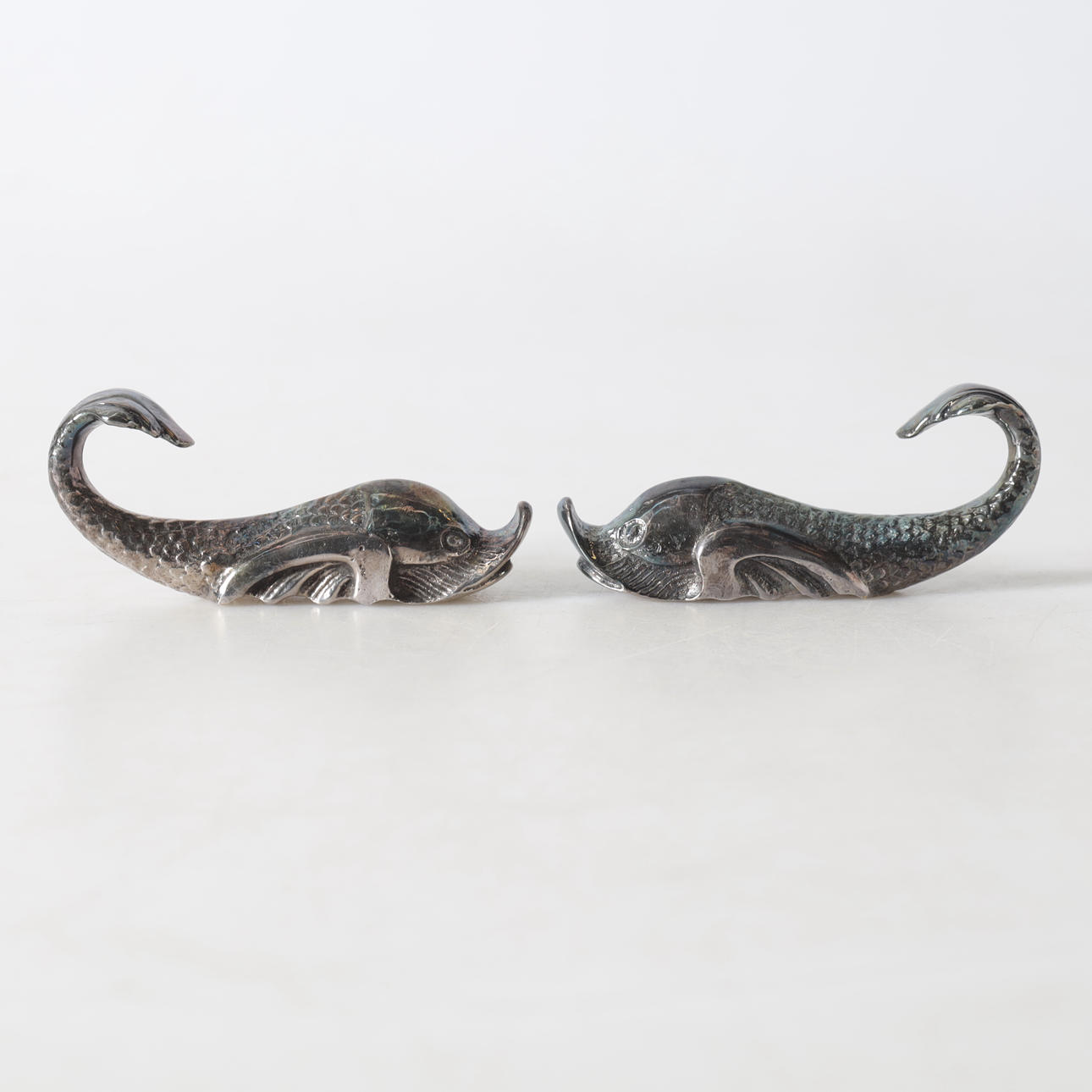 TABLE DECORATIONS, 1 pair, nickel silver, Cutajar Works, Malta.