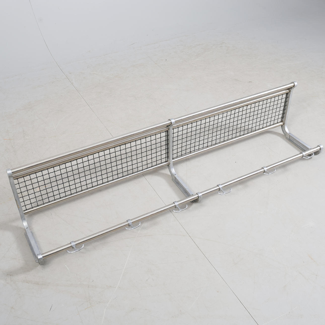 A chrome, aluminium hat shelf, mid 20th century.