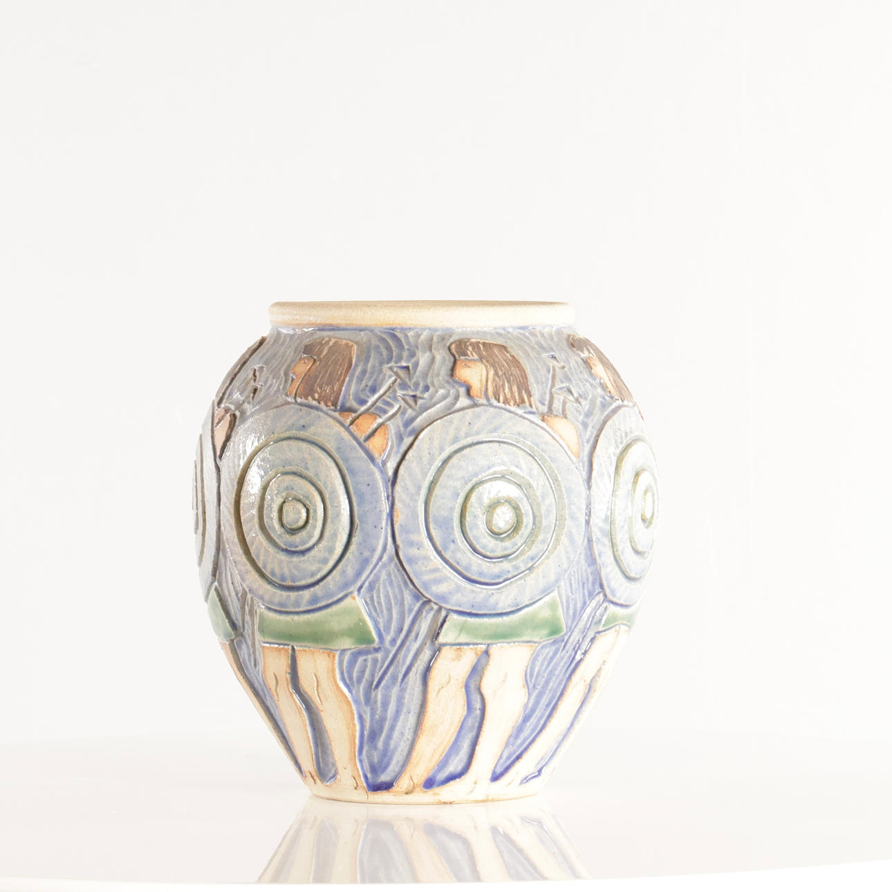 Vase with decorative blue glaze motif.
