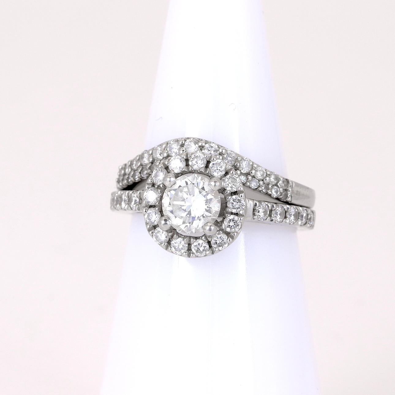 SET OF TWO PLATINUM & DIAMOND SET RING.