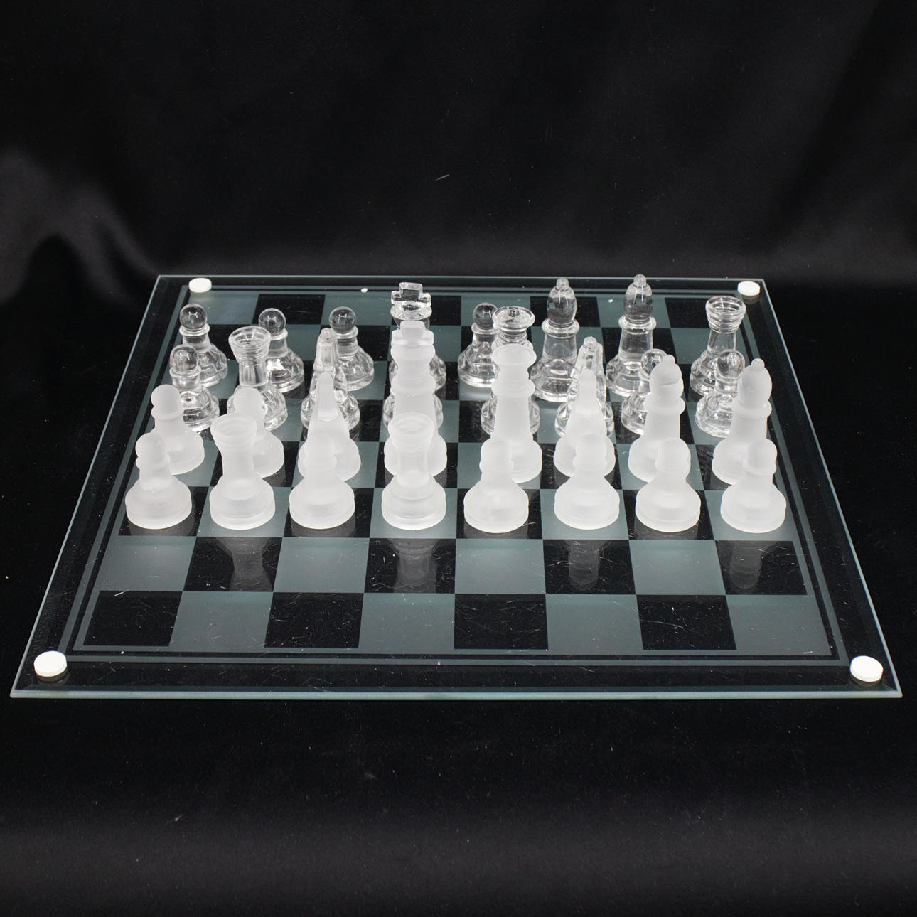 CHESS GAME, playing field and game pieces made of glass, contemporary.