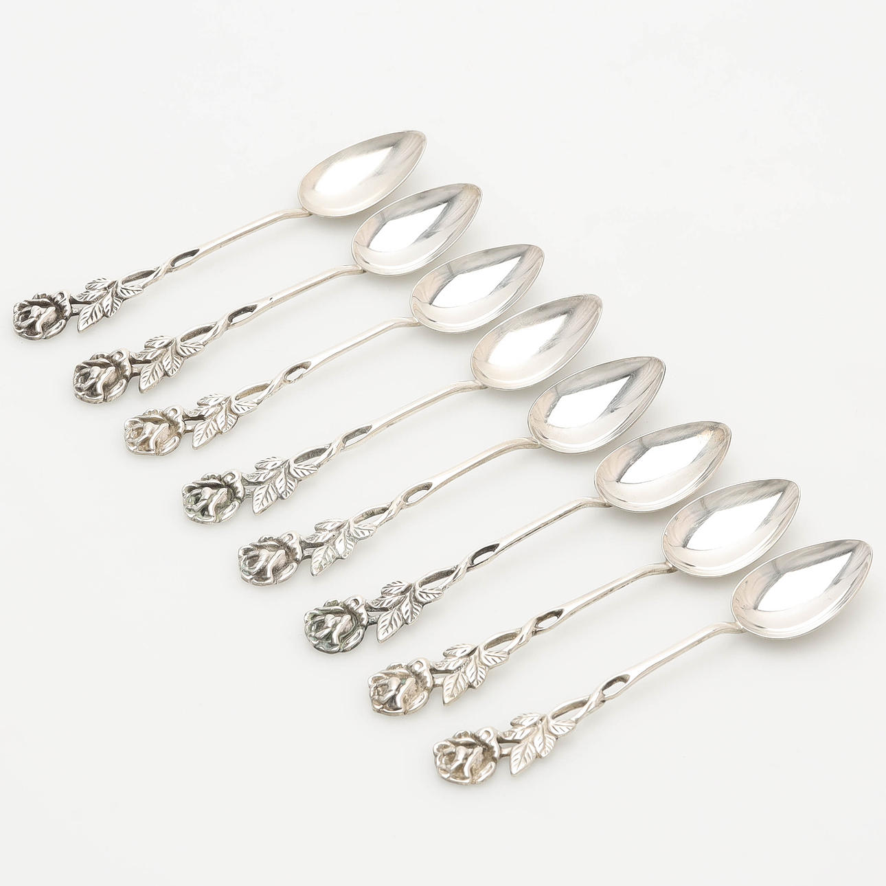 A set of 8 silver “Rosen” spoons, GEWE.