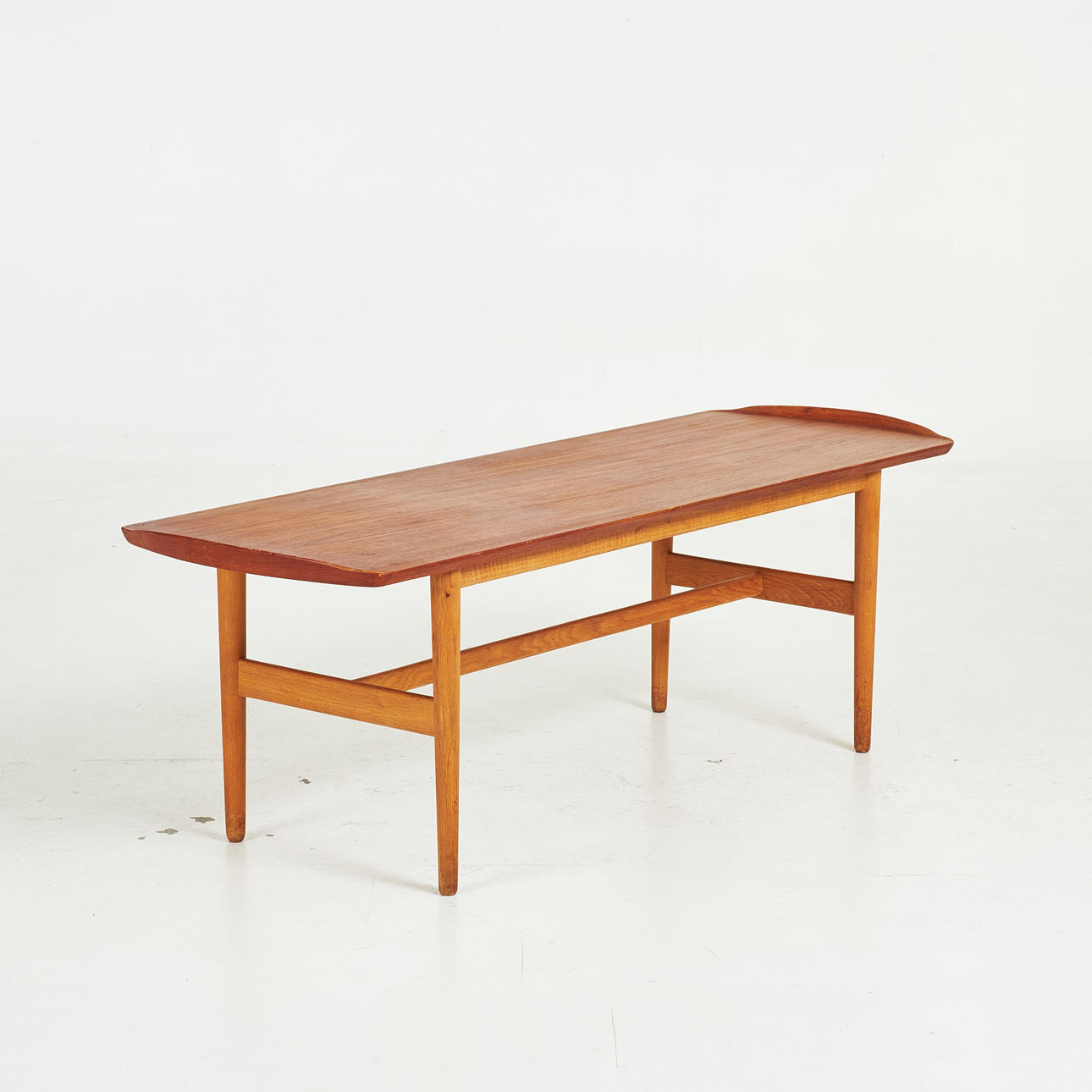 A teak veneer coffee table, 20th century.