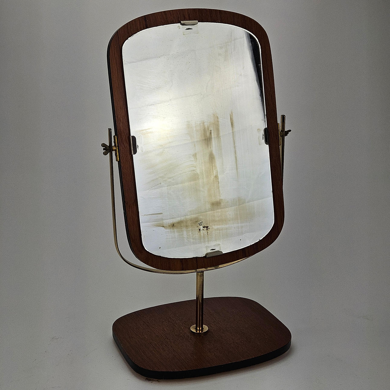 A 1950s/60s teak table mirror.