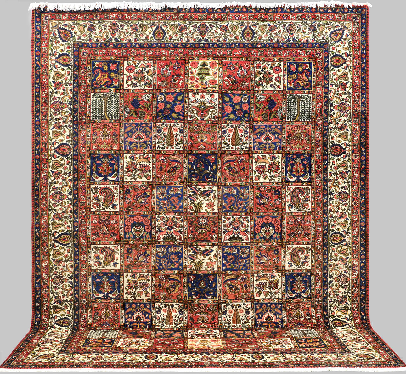 CARPET. Figural Baktiari garden pattern, 404 x 308 cm.