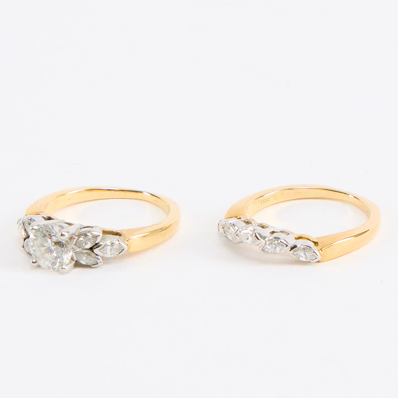 RINGS. Two, 18K gold and diamonds.