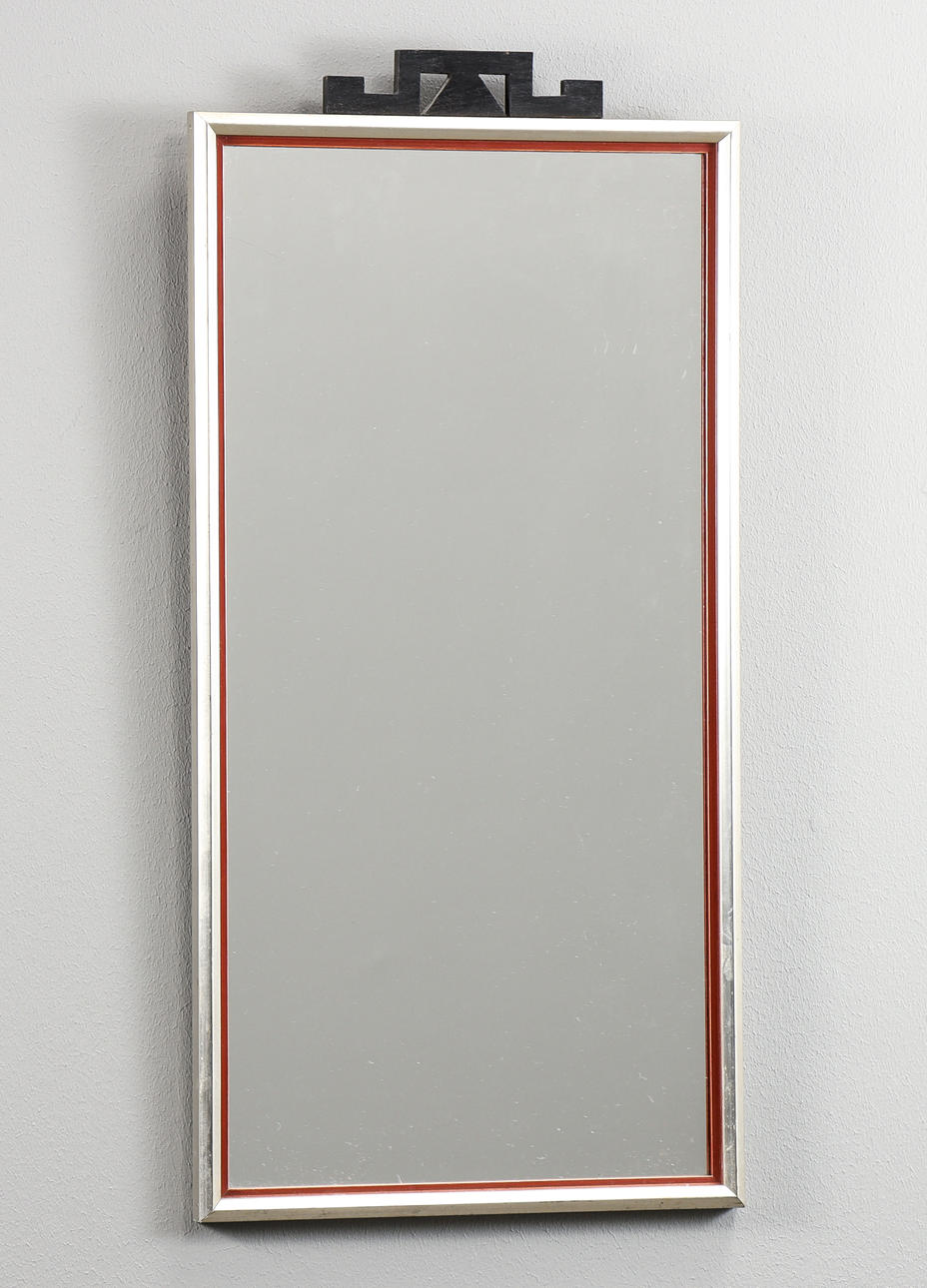 A 1930s Art Deco mirror.