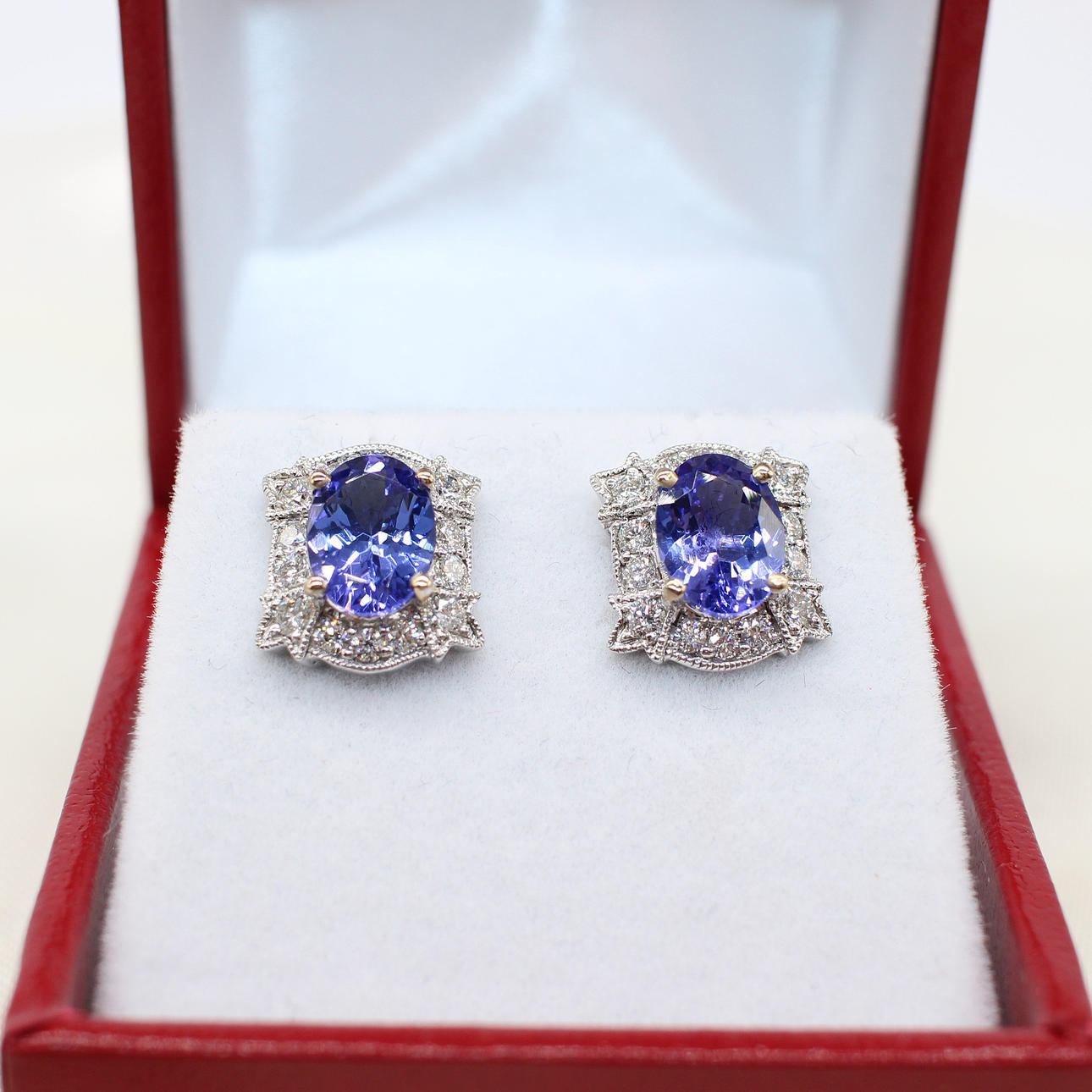 TANZANITE & DIAMOND EAR STUDS.
