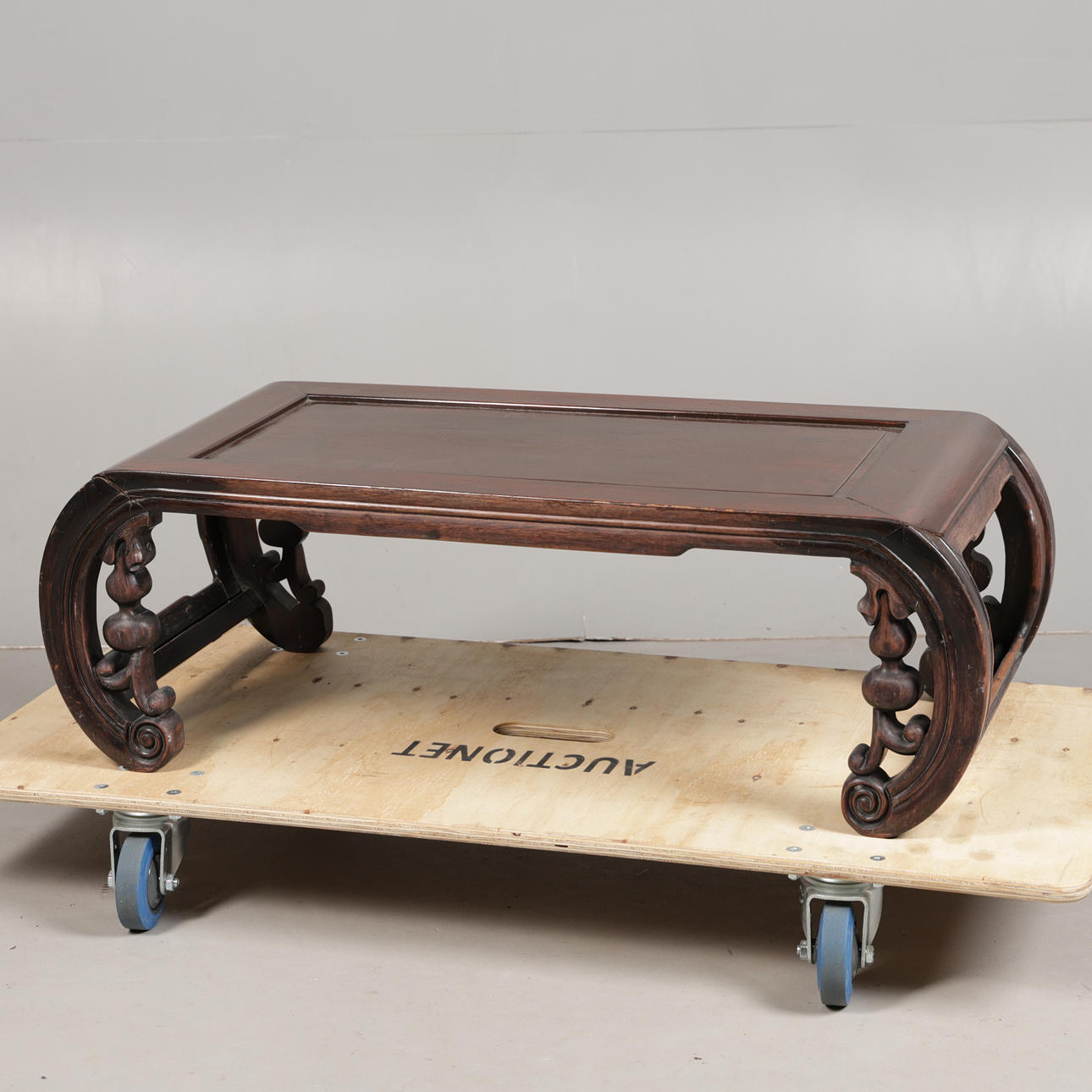 A CHINESE HARDWOOD LOW COFFEE TABLE.