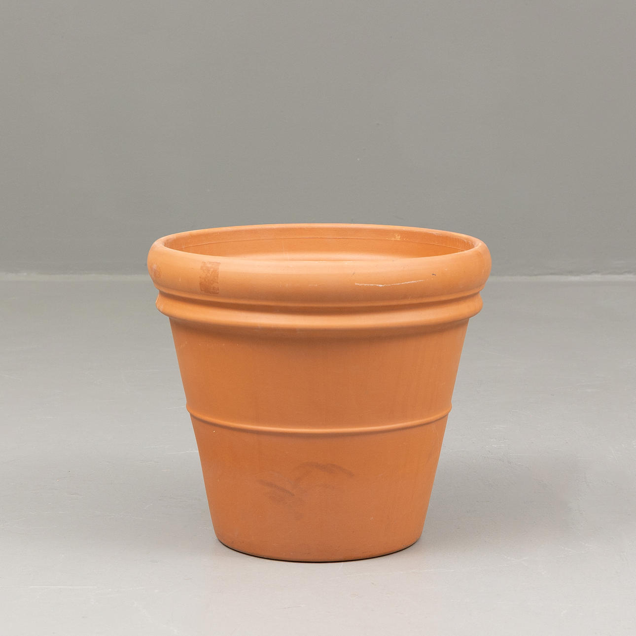 A pot, terracotta, made in Italy.