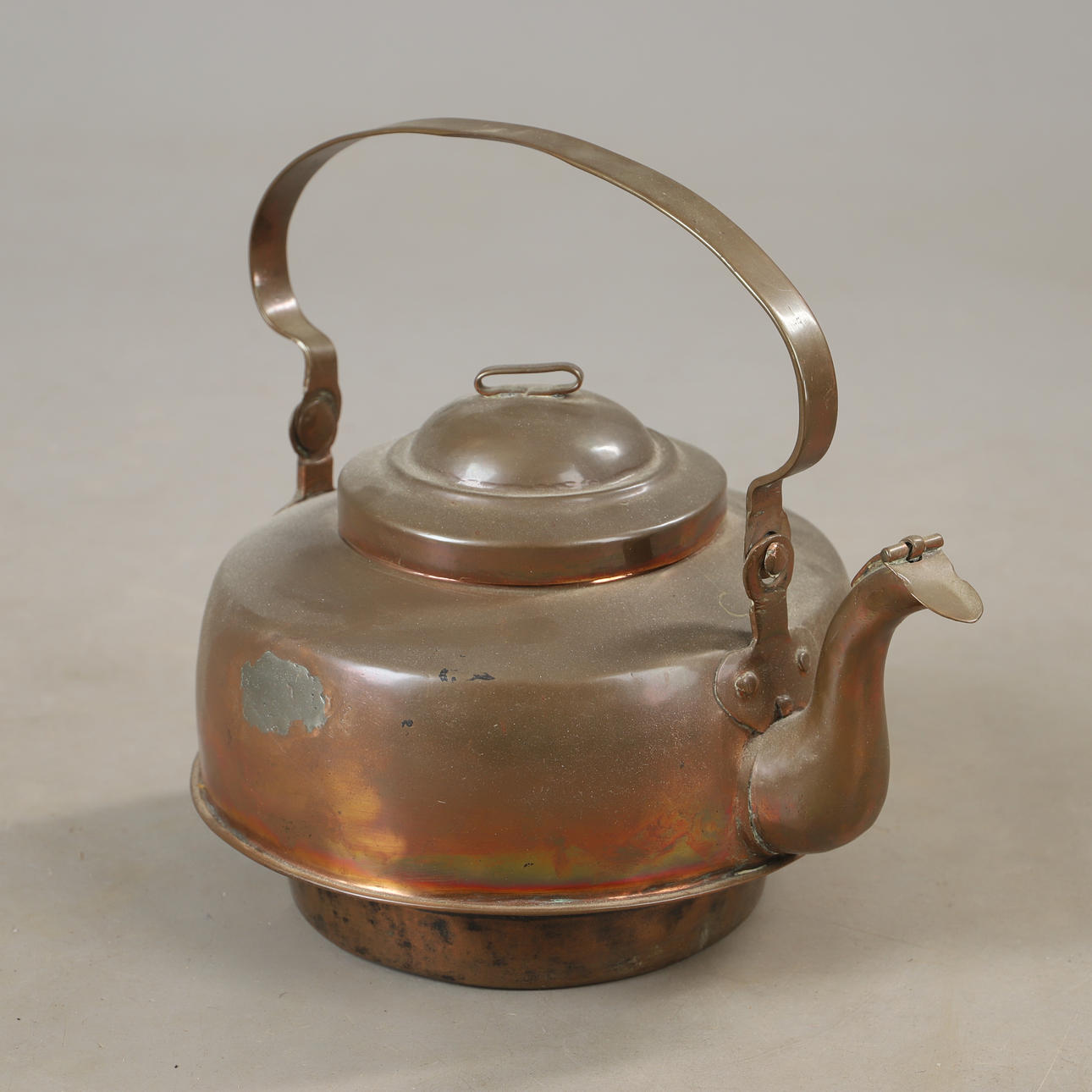 A 19th century copper cauldron.
