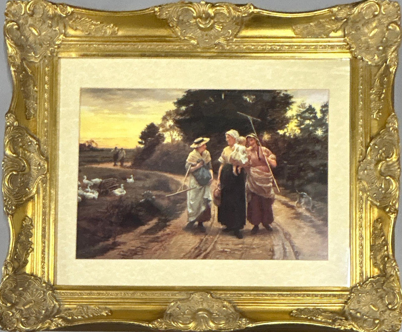 A GILT FRAMED PRINT.