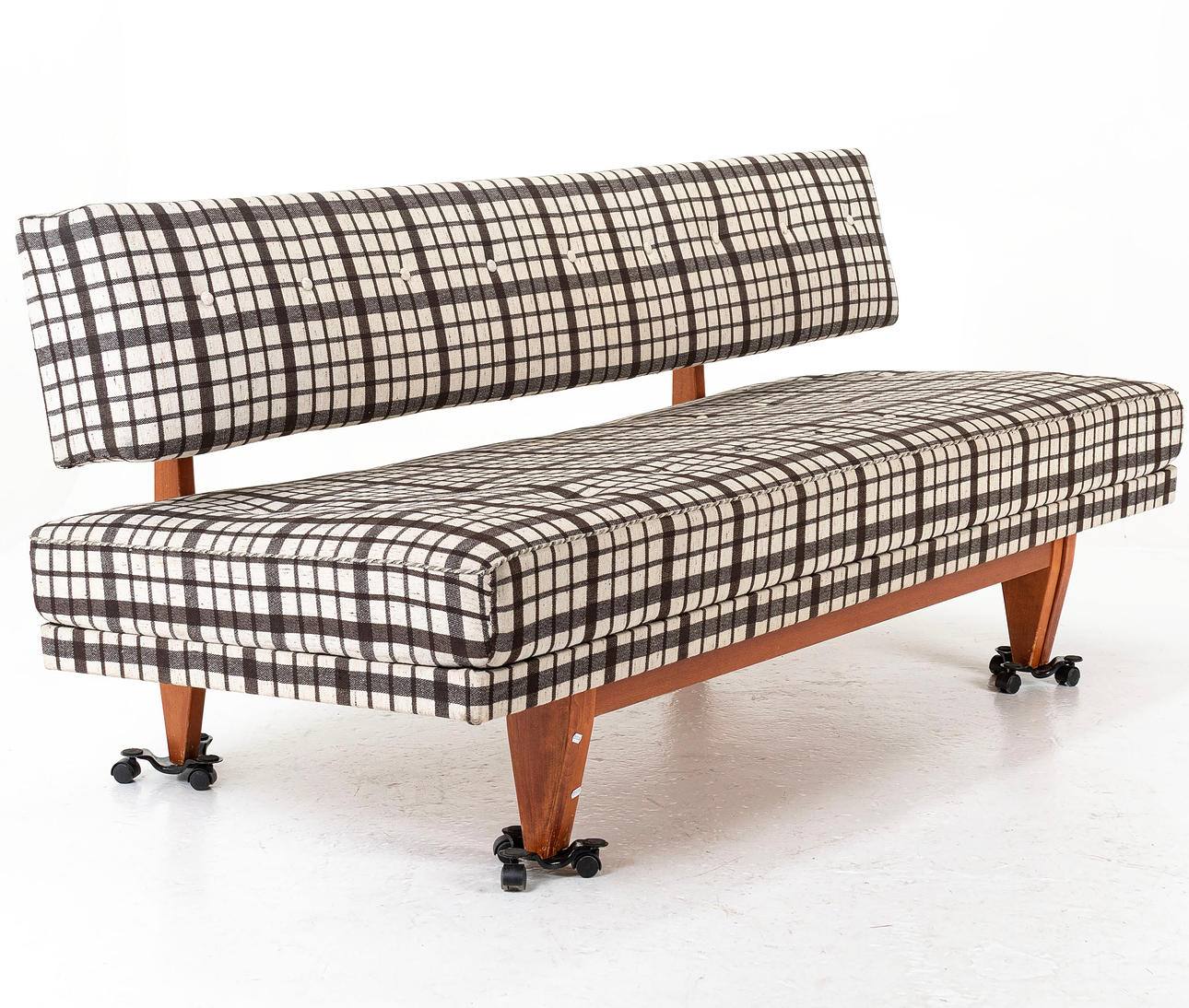 A teak sofa and daybed, mid 1900's.