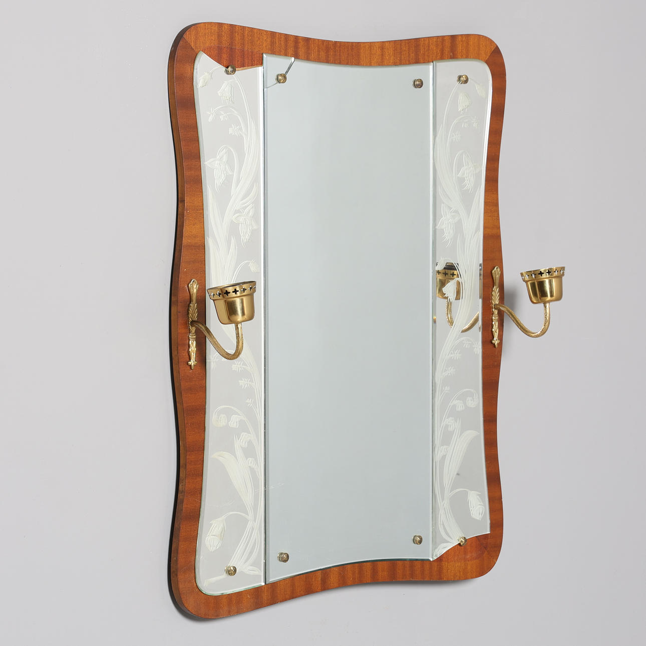 A mirror with lighting, mid 20th century.