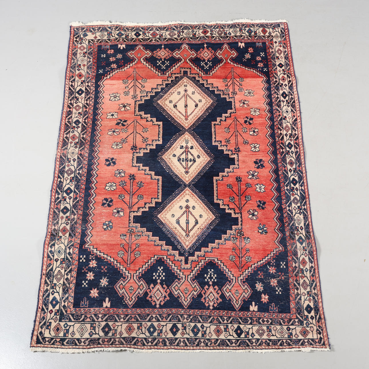 A CARPET, hand-knotted, 233 x 166 cm.