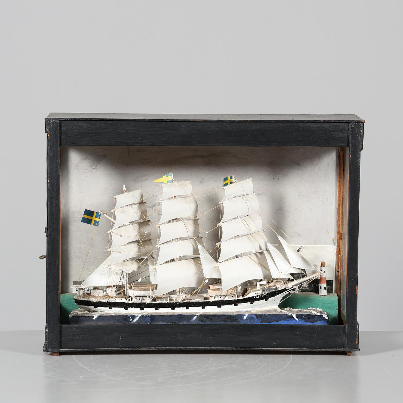 BOAT MODEL in cabinet.