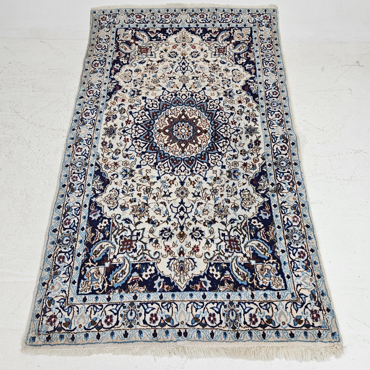 An oriental rug, approx. 198x118 cm.