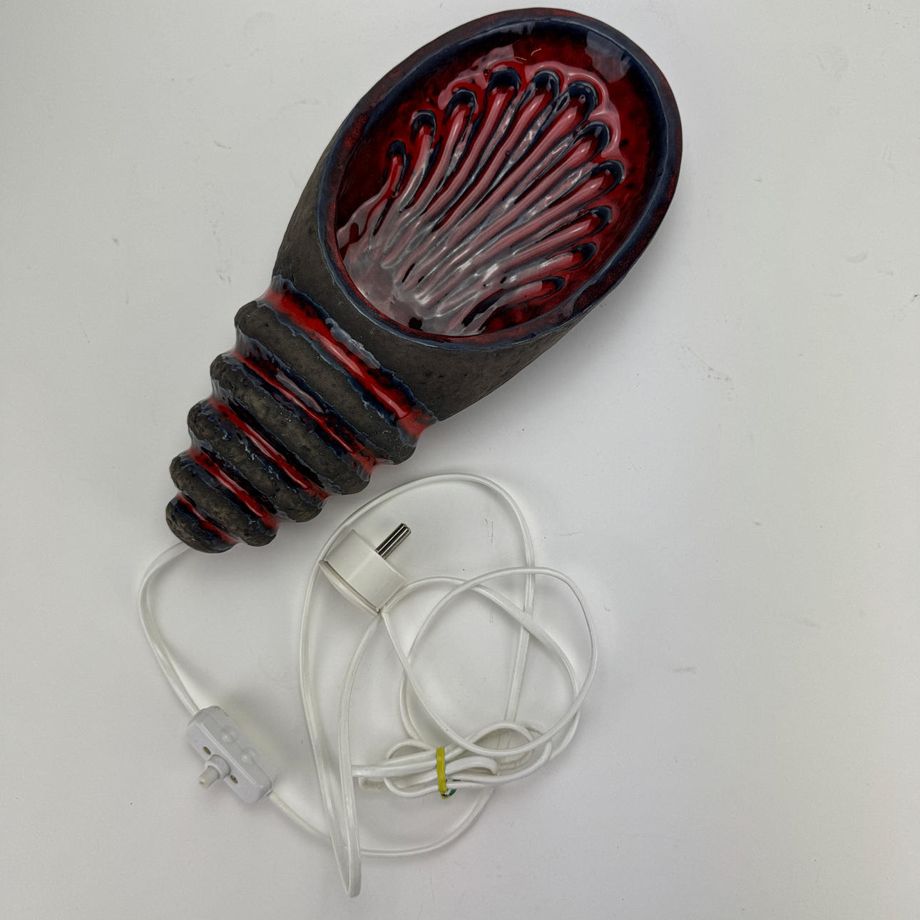 A ceramic wall lamp, seashell, Norrman, Motala, signed.