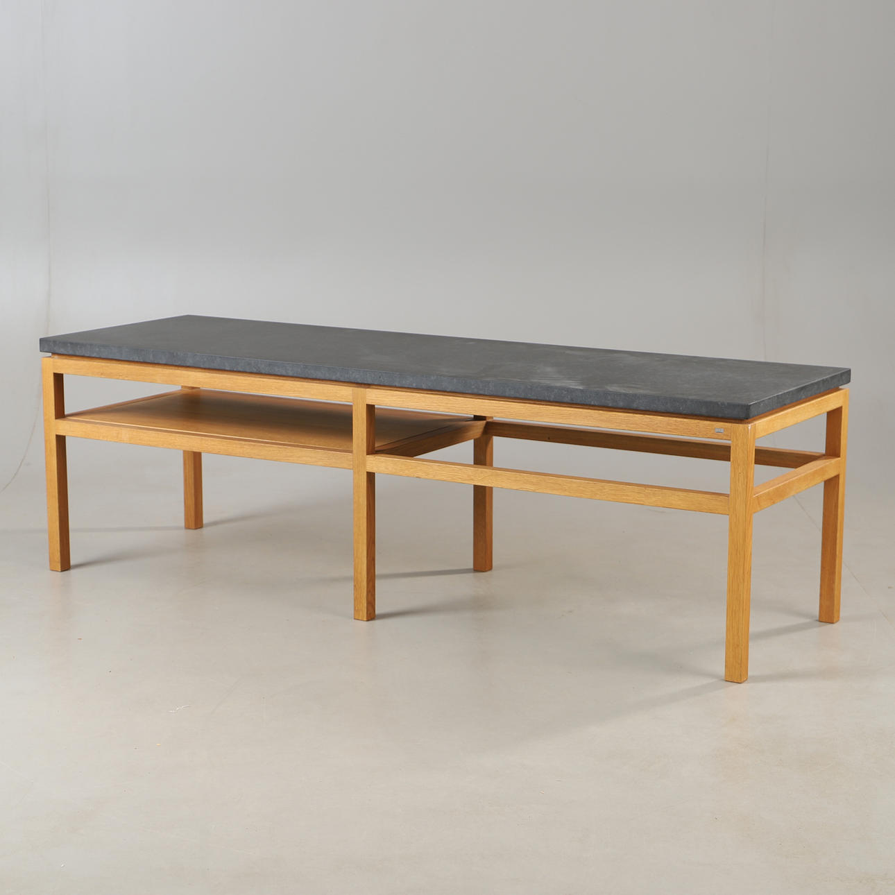 COFFEE TABLE, “Bläse”, oiled oak with diabase top, G.A.D.