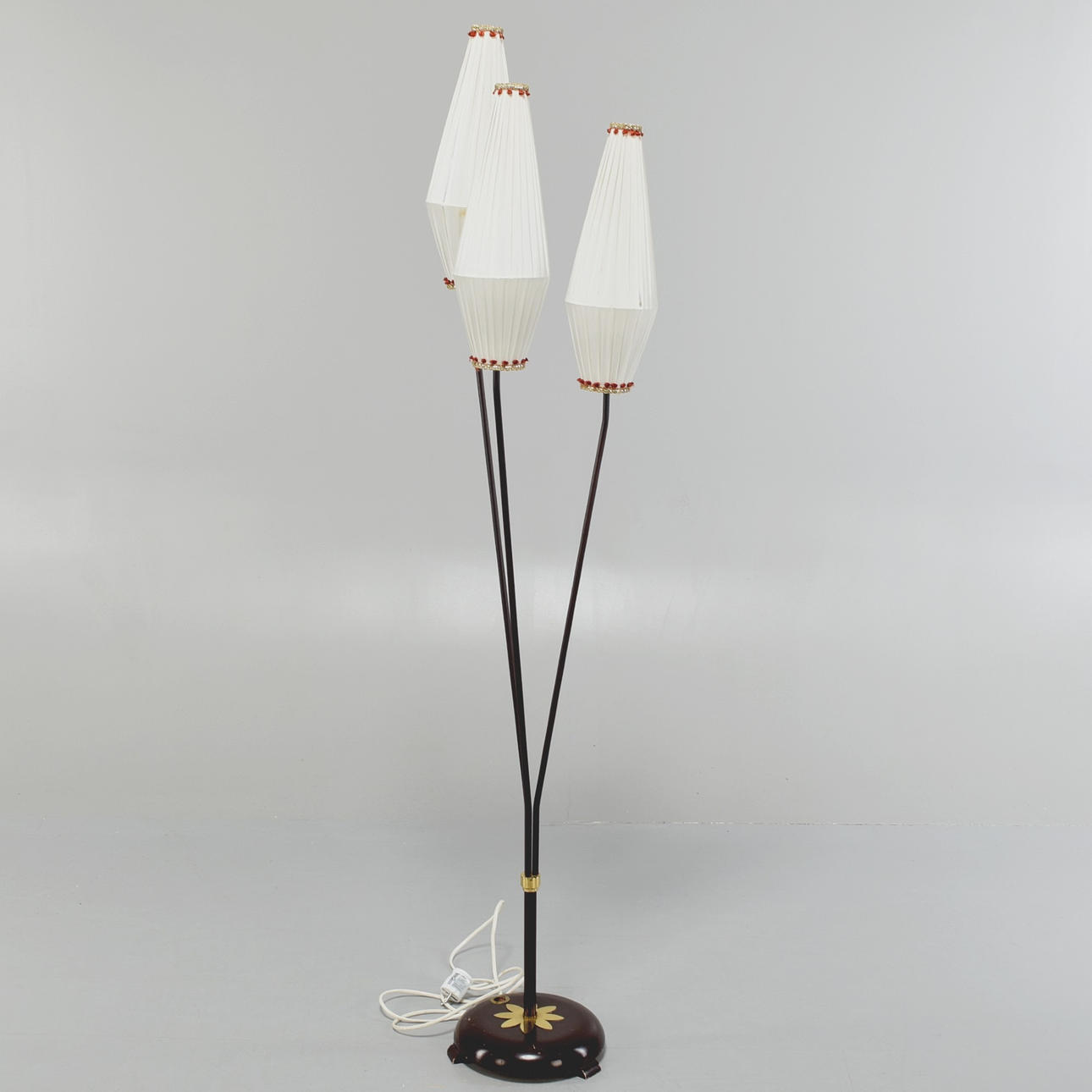 A 1950's three-arm floor lamp.