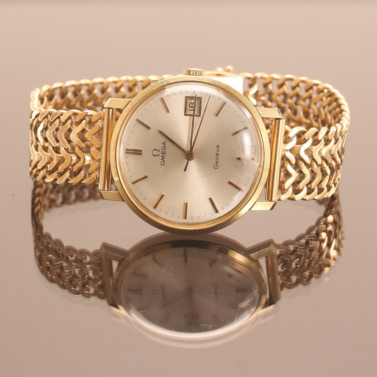 HERRARMBANDSUR, Omega, 18 k guld.
