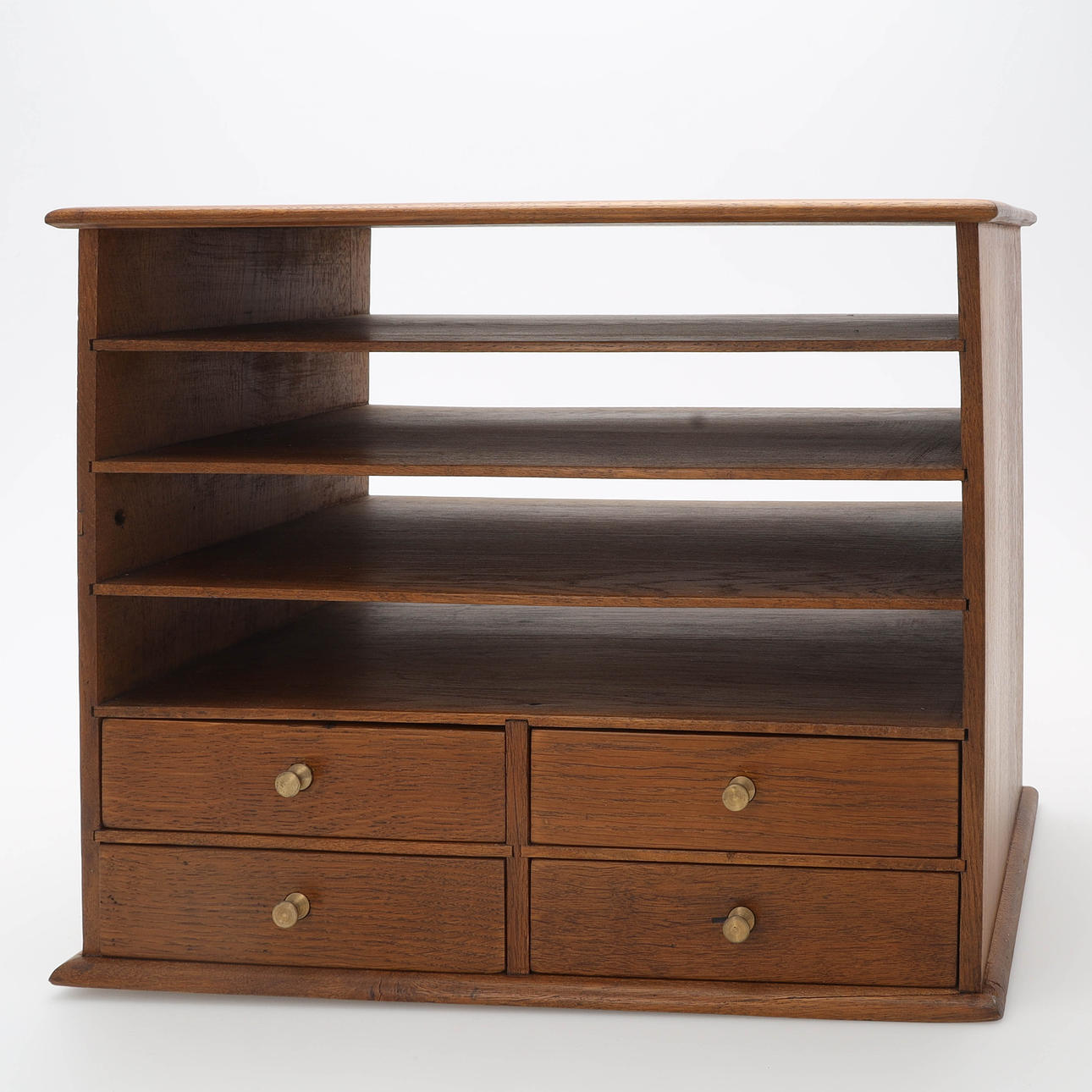 A 20th century stained oak table shelf.