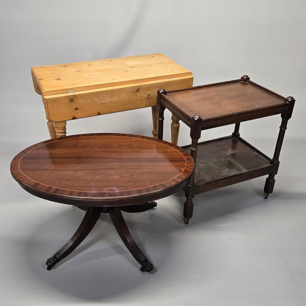 TWO TABLES AND A TROLLEY.