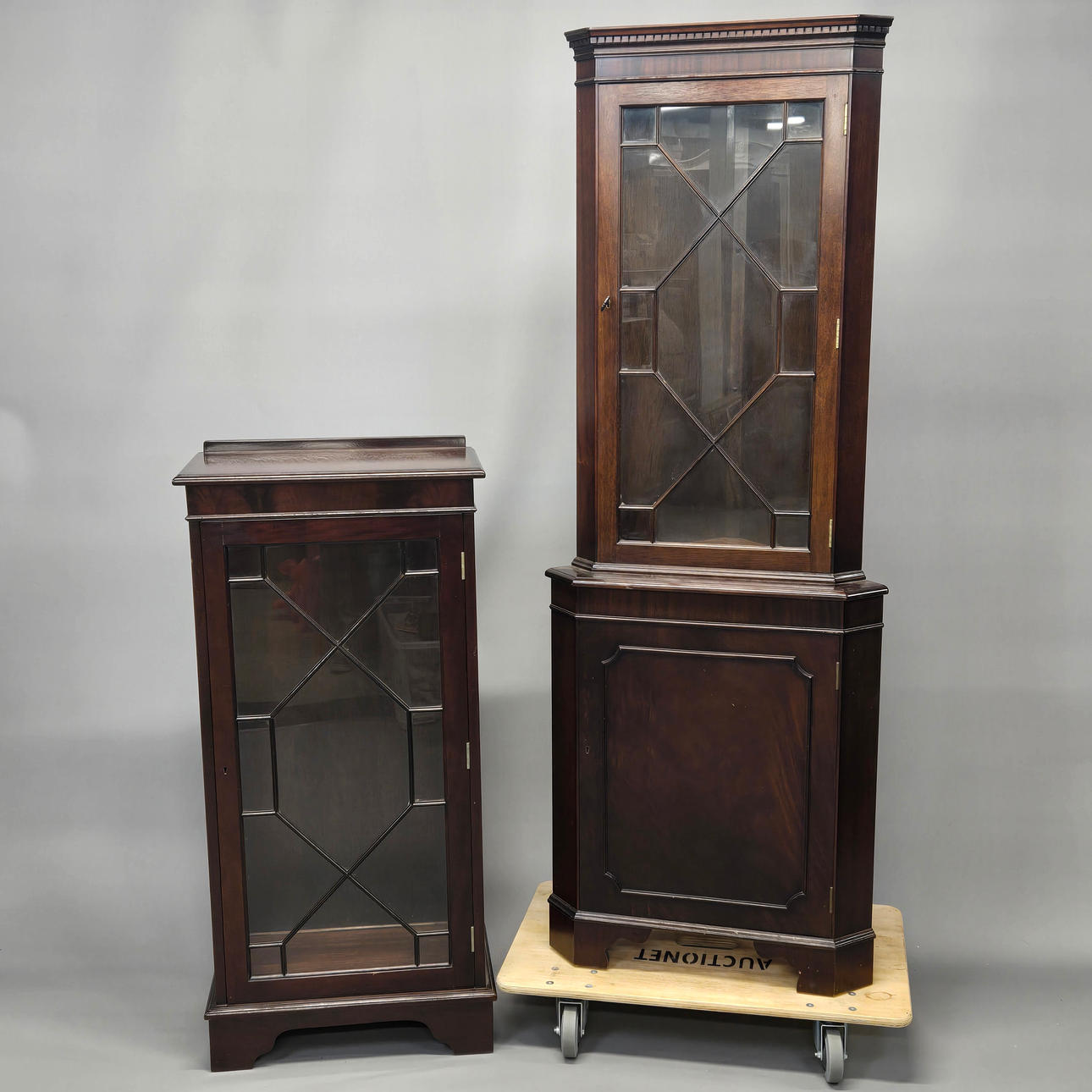 TWO MAHOGANY VENEERED DISPLAY CABINETS.